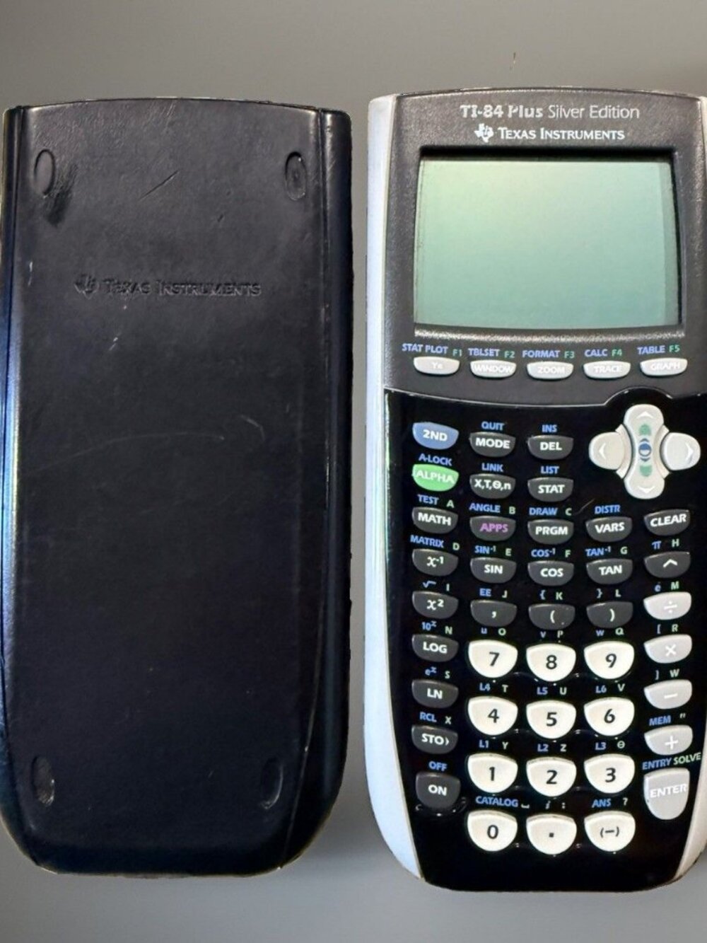 Texas Instruments TI-84 Plus Silver Edition Graphing Calculator w/ Cover